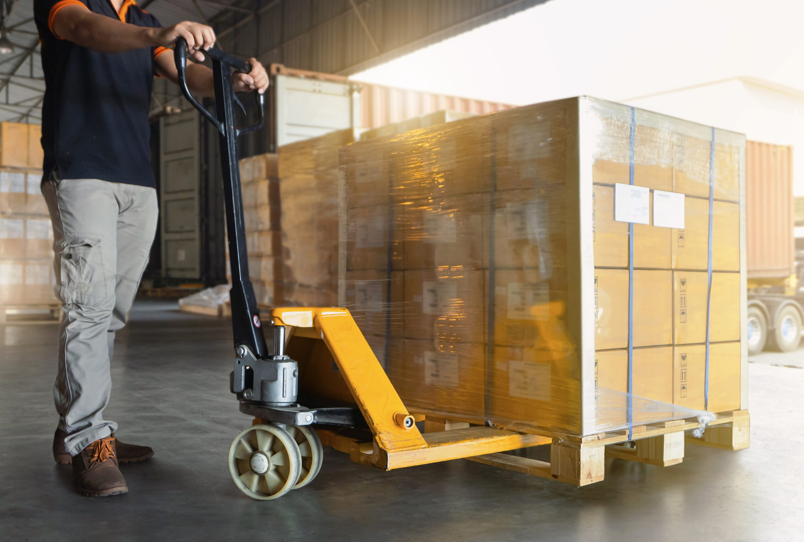 worker-courier-unloading-package-boxes-warehouse-shipent-boxes-supply-chain-shipping